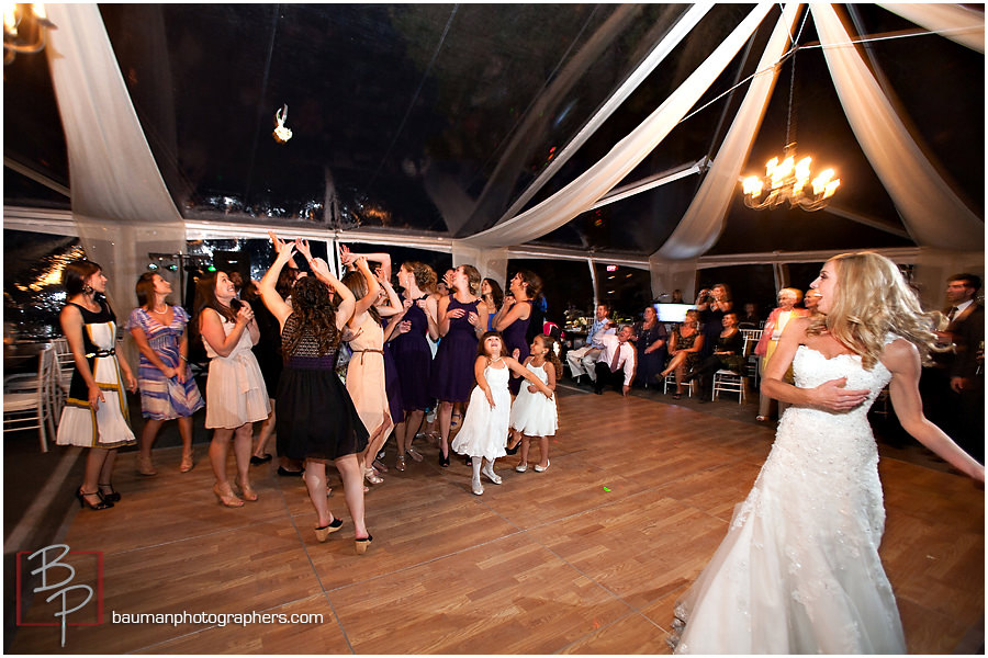 bouquet toss wedding photo 