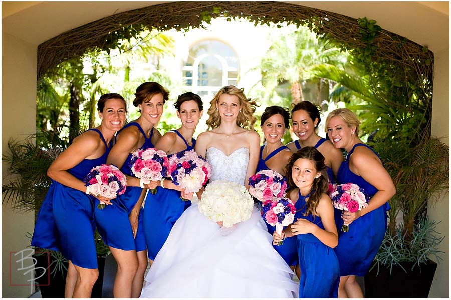 radiant bride with bridesmaids