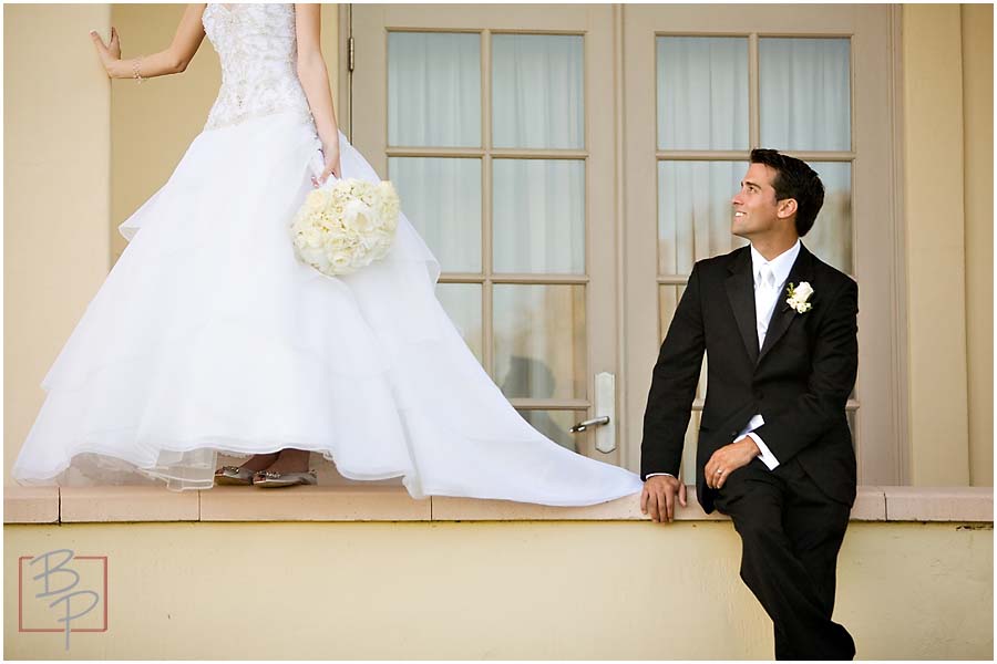 the groom gazes at his bride