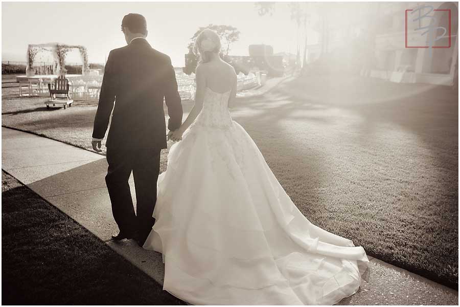 bride and groom walking away