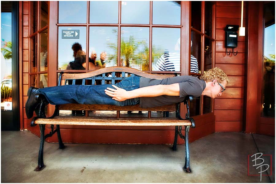 Guy playing with the chair 