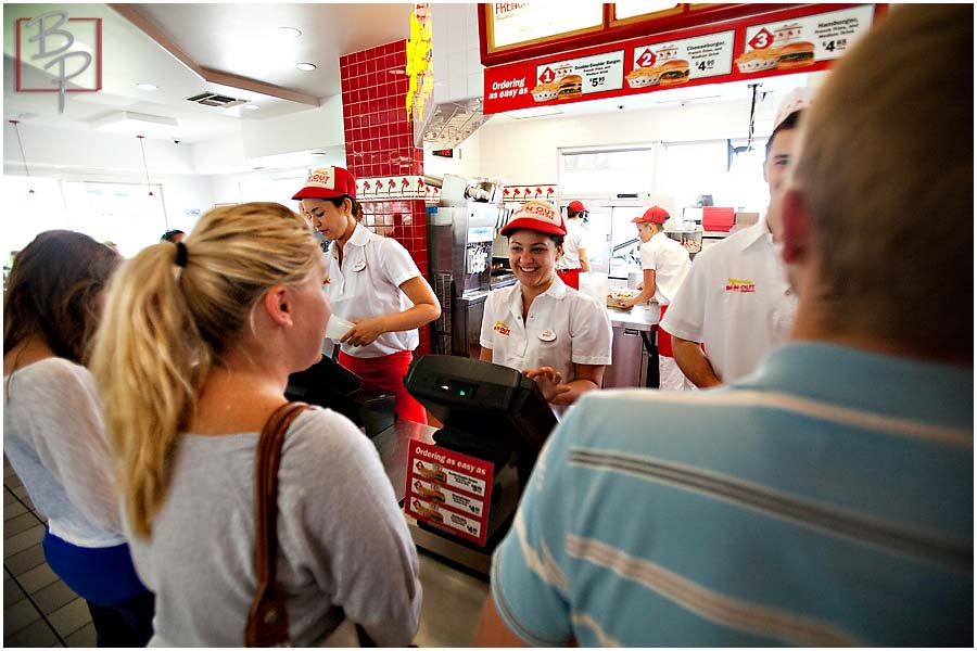 Girl ordering at In N Out counter