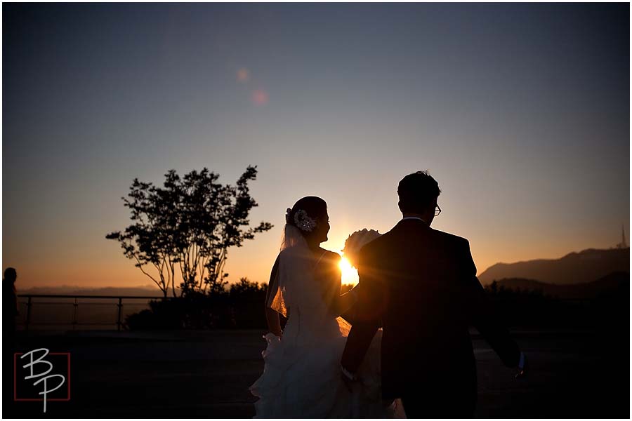 Bride and groom as the sun sets