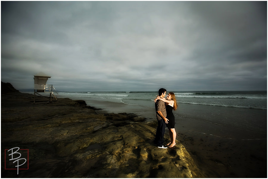 dramatic beach engagement picture