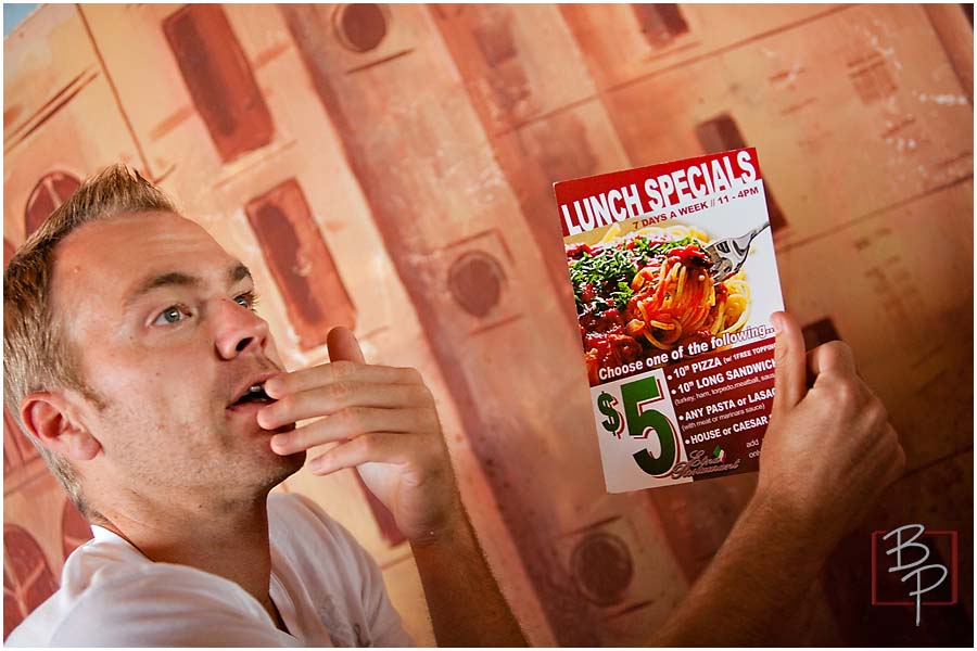  Guy holding the sales of the restaurant at El Cajon, in San Diego