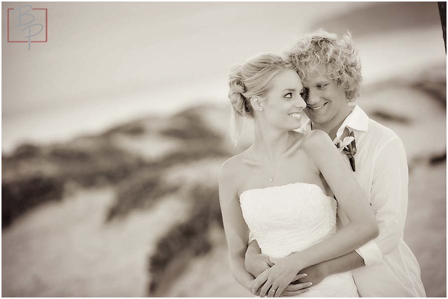 The bride and groom on the beach