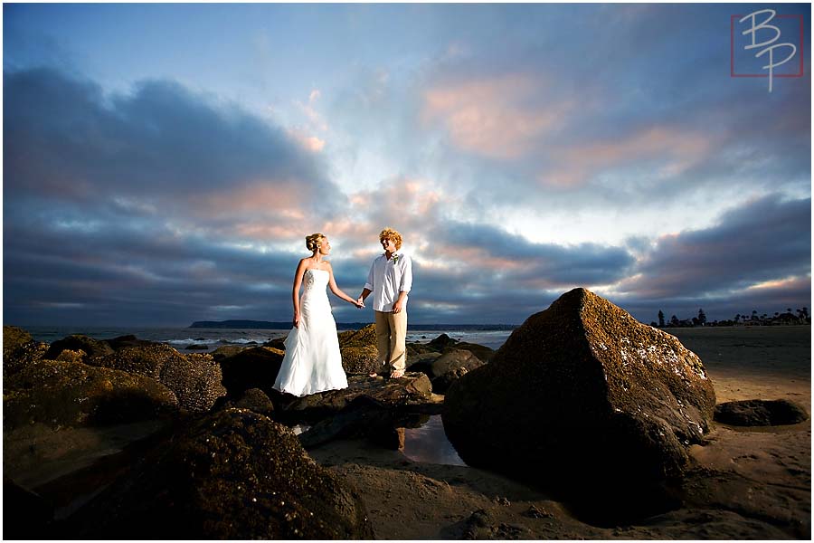 The bride and groom at sunset