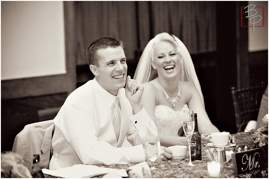 Bride and groom photographs during reception