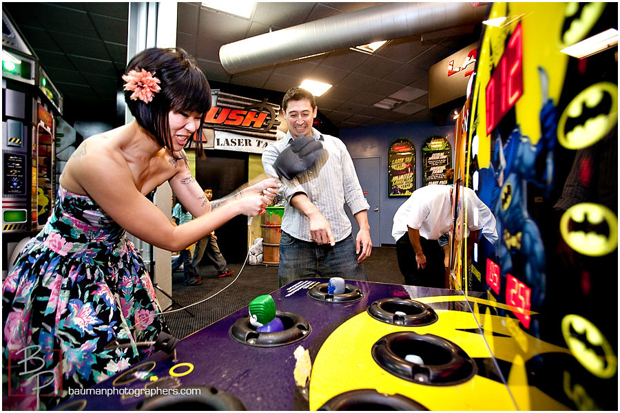 engagement photos in arcade at Belmont Park