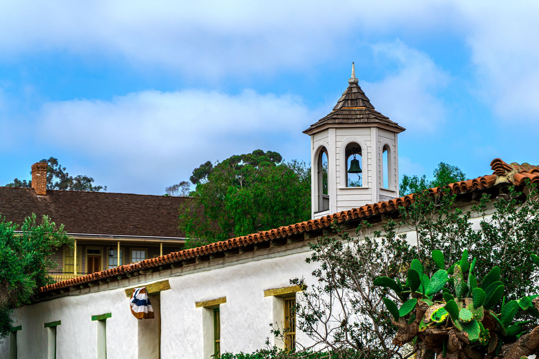 Historic building with a bell tower and tiled roof